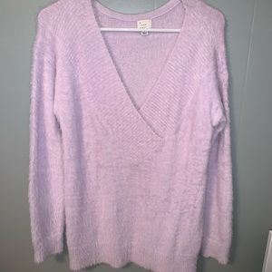 V neck sweater.